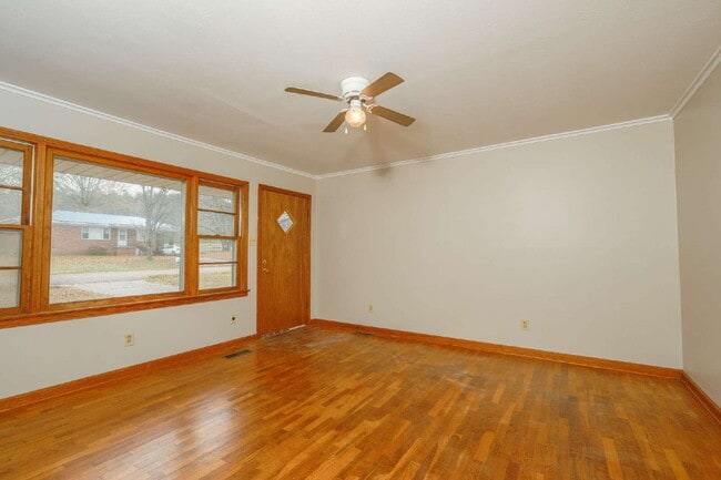 Building Photo - "Charming 3-Bedroom Greenfield Home with Gleaming Hardwood Floors – 1256 Sq Ft of Cozy Comfort!"