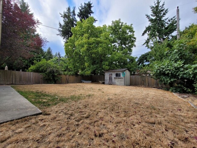 Building Photo - Bright Four-Bedroom Home with Spacious Outdoor Area