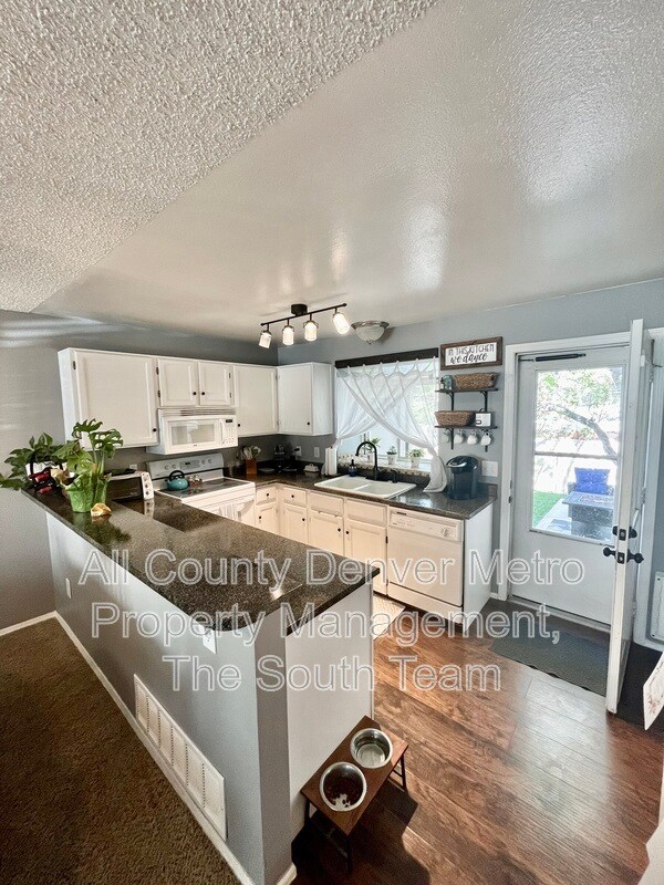 Building Photo - 9623 W Chatfield Ave