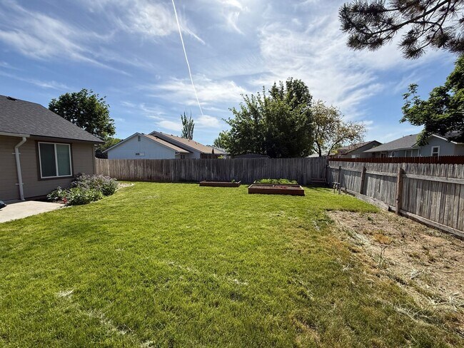 Building Photo - Updated 4-Bedroom Corner Lot Home with New Flooring, Carpet & Fresh Interior Paint