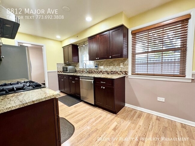 Building Photo - 8812 Major Ave