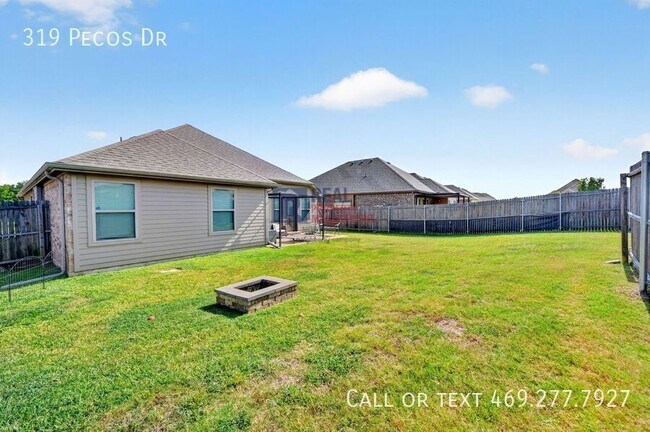 Building Photo - 319 Pecos Dr