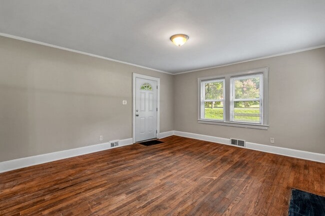 Building Photo - Adorable Home, Just Painted, Wood Flooring...
