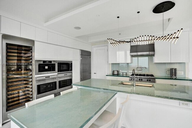 Building Photo - 9705 Collins Ave
