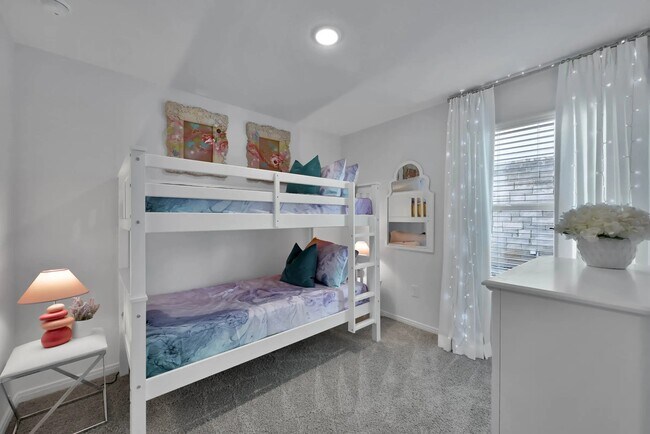 Discover the perfect blend of comfort and style at Esperanza at Wild Orchid. This beautifully designed space offers cozy bunk beds, a serene atmosphere, and modern finishes. Don’t miss out on your dream living experience—schedule a tour today! - Esperanza at Wild Orchid