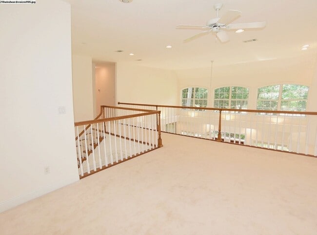 Building Photo - Executive Lakeview Home in Gated Windward Community!