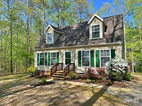 Building Photo - Cape Cod on Large Wooded Lot