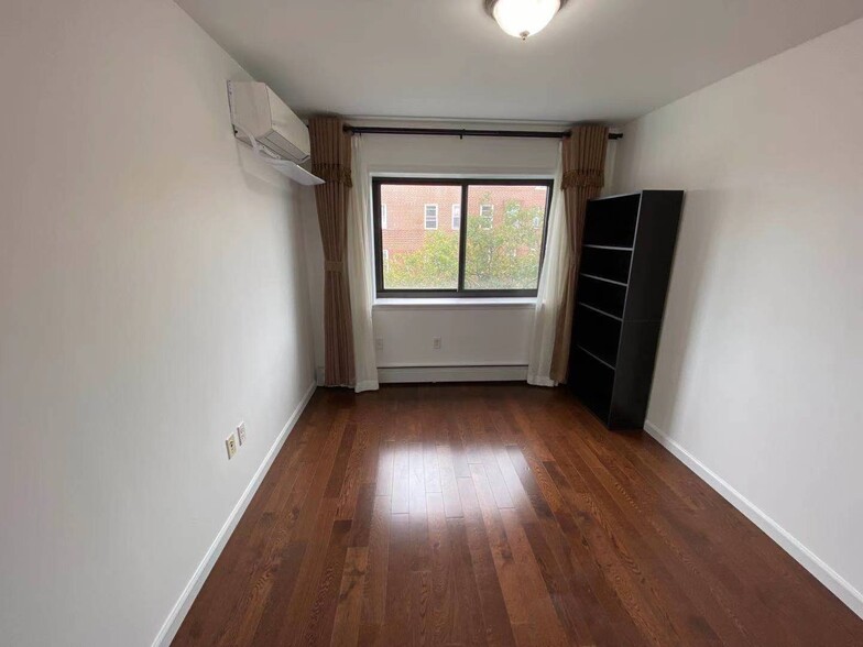 Guest Bedroom facing window - 9411 65th Rd