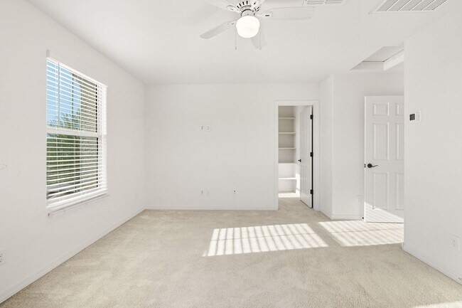 Building Photo - Three Bedrooms! Newer Neighborhood - conve...
