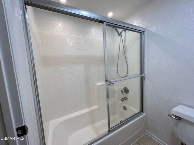 Building Photo - Welcome to this beautifully situated first-floor end unit