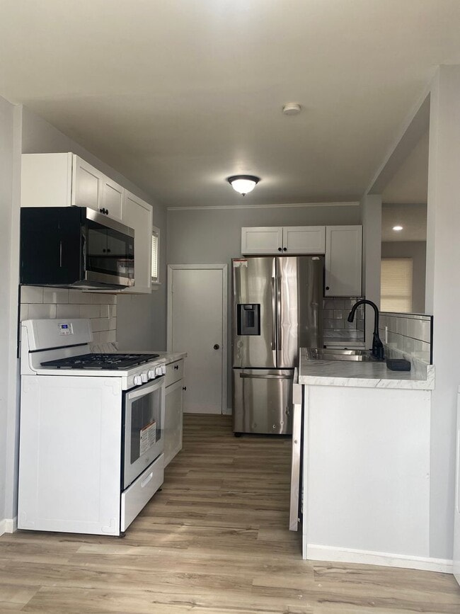 Building Photo - Available Now!