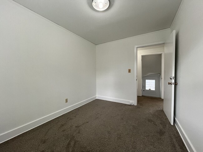 Building Photo - Expansive 4BR 2,900+ Sq Ft Home with Theater-Style Living Room & Bonus Hobby Workshop
