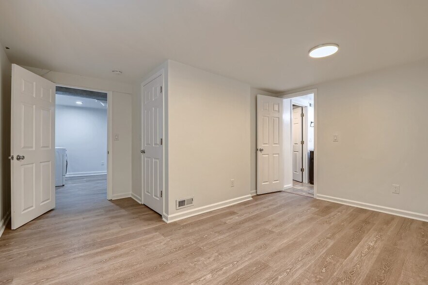 Small walk-in closet in basement bedroom - 451 NE Sumner St