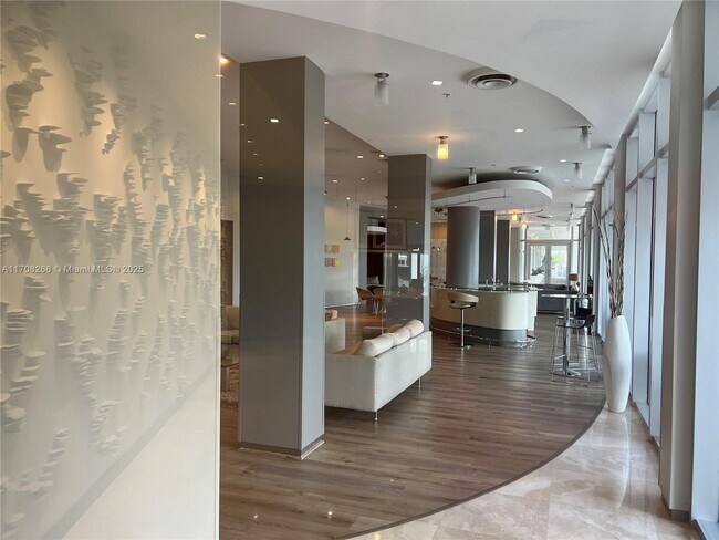 Building Photo - 10275 Collins Ave