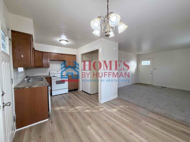 Building Photo - Two Bedroom Duplex | New Flooring