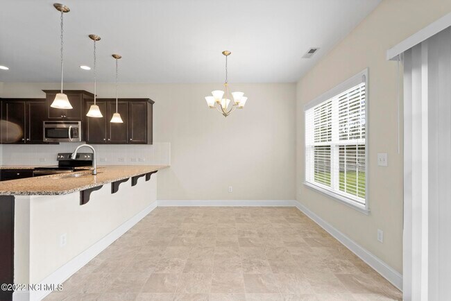 Building Photo - 305 Vilas Way S