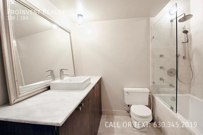 Building Photo - Available Now! Sprawling Sun-drenched 1Bed...