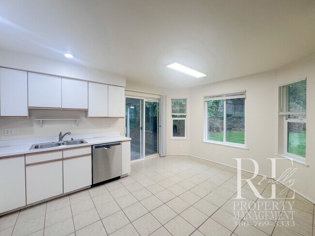 Building Photo - Duplex Living with Expansive Yard, LVP Flooring & Spacious Layout