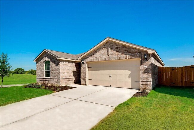 Building Photo - This lovely 4 bedroom home features a large family room with lots of light.