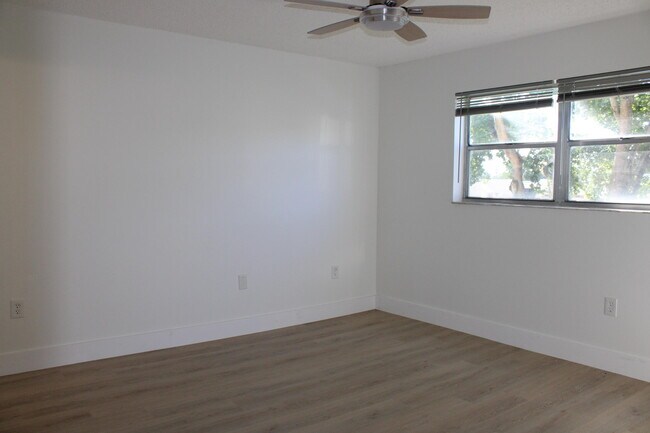 Building Photo - 8130 Sunrise Lakes Blvd
