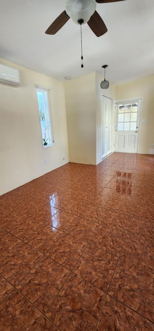 Building Photo - Studio Cottage w/ huge storage shed! Move-in Special