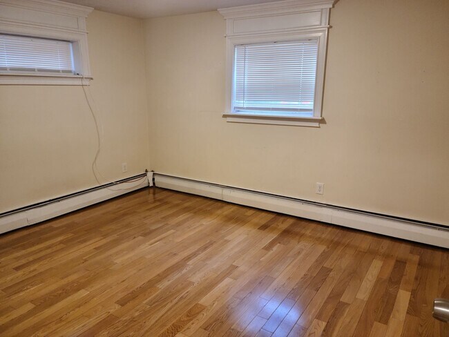 Building Photo - Off Street Parking - Short distance to T stop and Whole Foods - Updated kitchen and bathroom