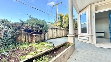 Building Photo - Sweet ground floor 1 Bedroom with a Sunny Wrap Around Deck and In-Unit Washer & Dryer