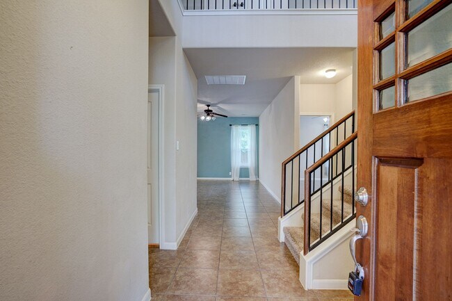 Building Photo - Bright & Roomy 4BR • 2.5BA • Two-Level Living