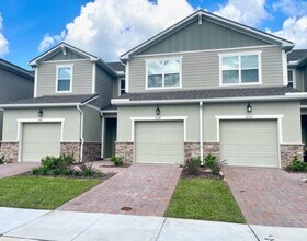 Building Photo - For Rent - 3 BEDROOM 2.5 BATHROOM TOWNHOUS...