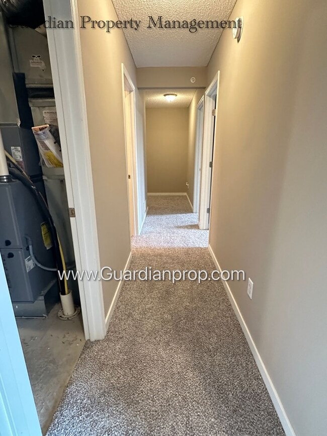 Building Photo - North Brooklyn Park Town Homes, Dedicated Office, 2 Car Garage, Washer/Dryer, Front Patio