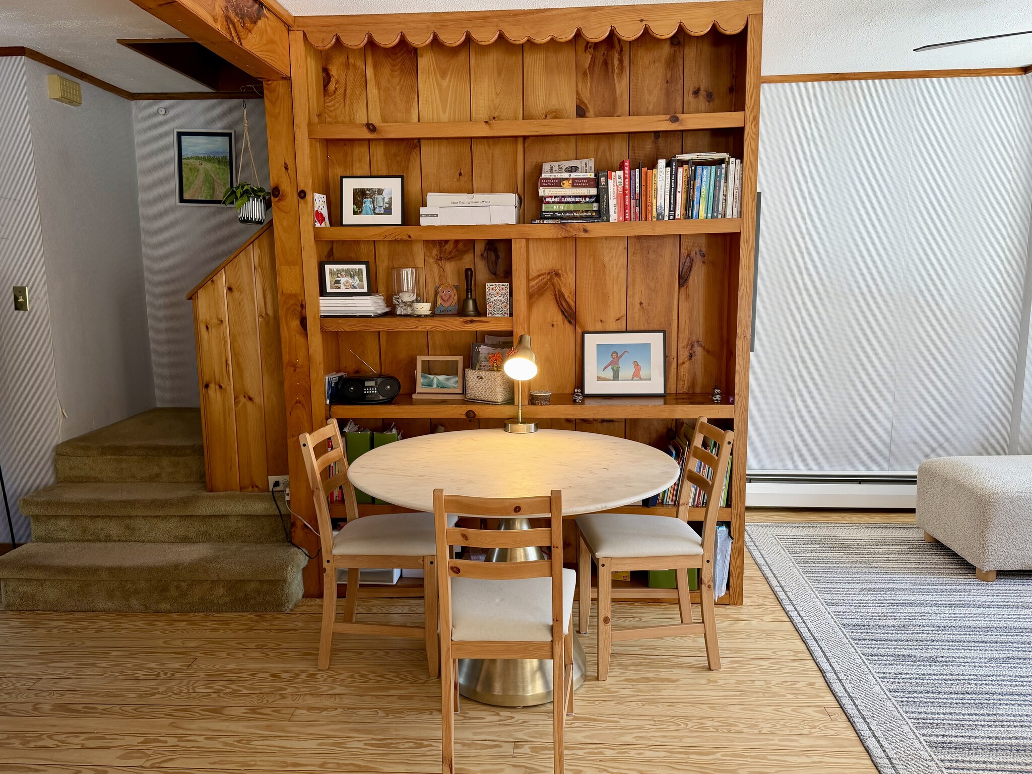 dining area with large bookshelf - 34 Boody St