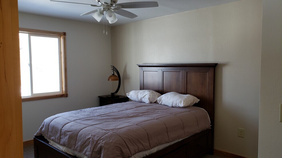 Master bedroom has a queen bed - 100 Monroe Ave
