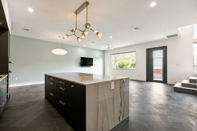Building Photo - LUXURY TOWNHOME IN LONE STAR DISTRICT
