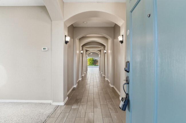 Building Photo - Stunning 4-Bed + Den Eastmark Home with Modern Upgrades Throughout