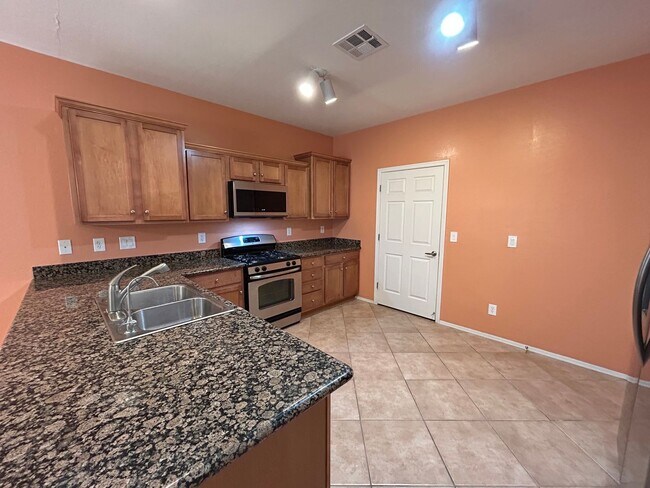 Building Photo - Gated 3-Bedroom 3-Bathroom Home in Southwest!