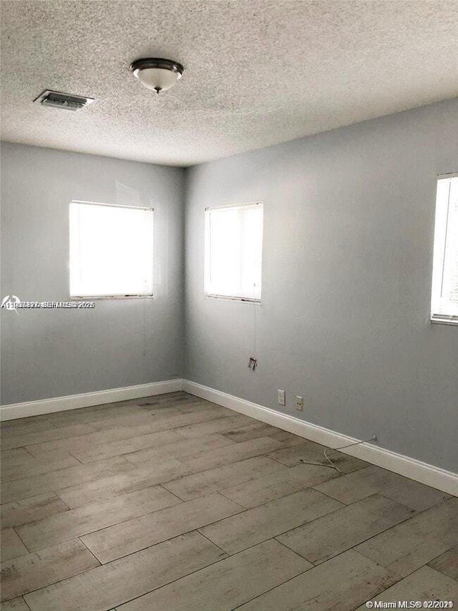 Building Photo - 1235 NE 3rd Ave