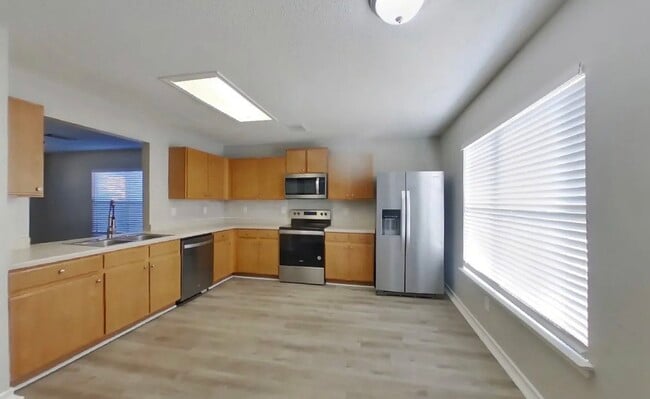 Building Photo - Contemporary 4-Bedroom Gem with Open-Plan Design