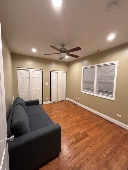 Bedroom 2- double closet w/ built in shelving - 2719 W 24th Pl