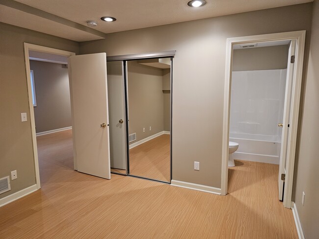 N Bedroom w/mirror closet doors - 620 Hubert St NE