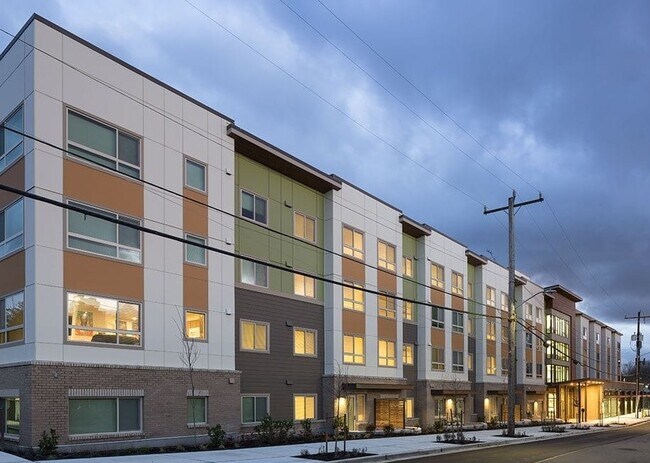 Building Photo - SPOKANE AT RAINIER COURT a 55+ Affordable ...