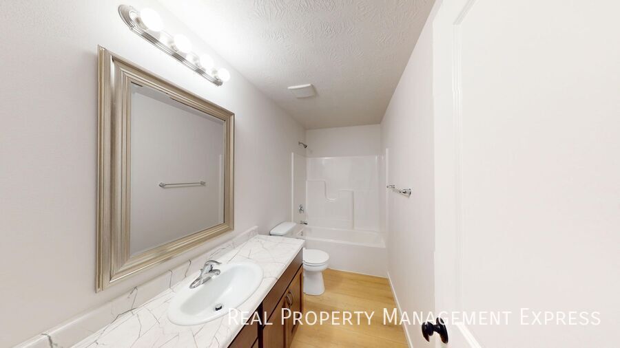 Building Photo - Modern 1 Bedroom Townhome with 1.5 Baths