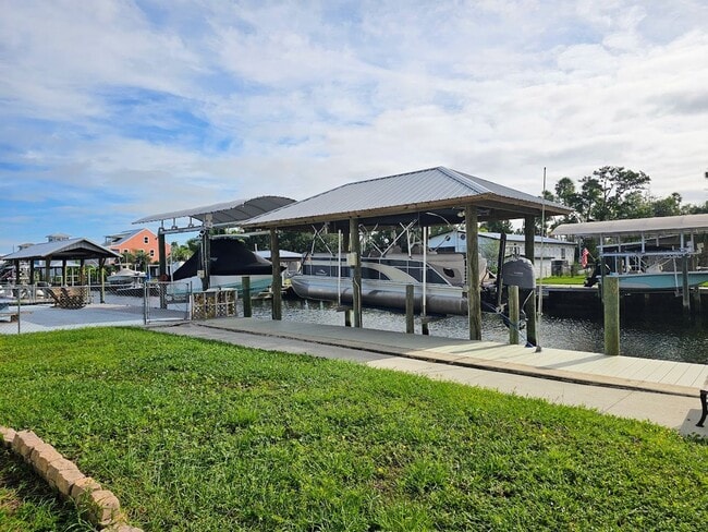 Building Photo - Waterfront 2 Bedroom, 2 Bath Stilt Home with Dock