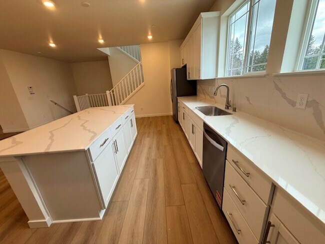 Building Photo - Elegant 4-Bed, 4-Bath 3-Story Home with Gourmet Kitchen & Private Backyard