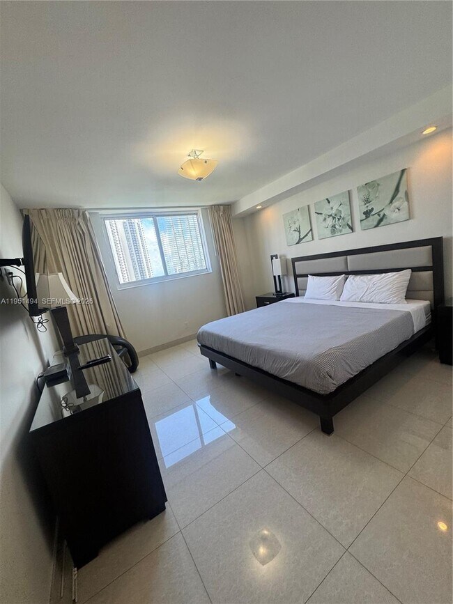 Building Photo - 19370 Collins Ave