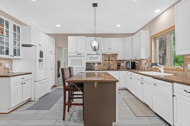 Building Photo - Luxury 4-Bed Retreat with In-Ground Pool & 3-Car Garage