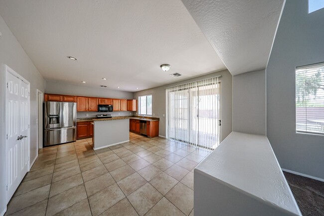 Building Photo - Welcome to this spacious 4 bedroom, 2.5 ba...