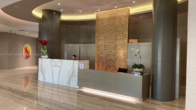 Building Photo - 10275 Collins Ave