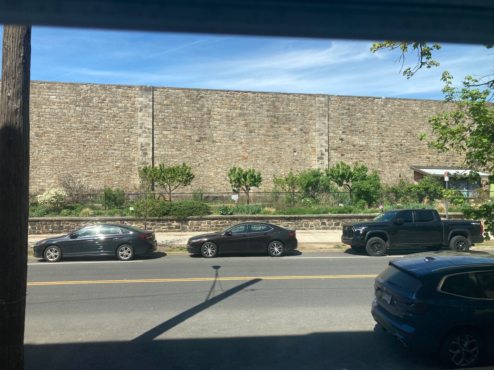 Eastern Penitentiary garden seen from living room - 721 Corinthian Ave