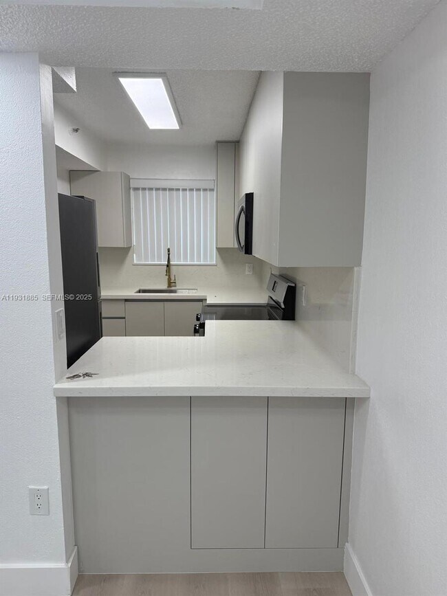 Building Photo - 7835 W 30th Ct