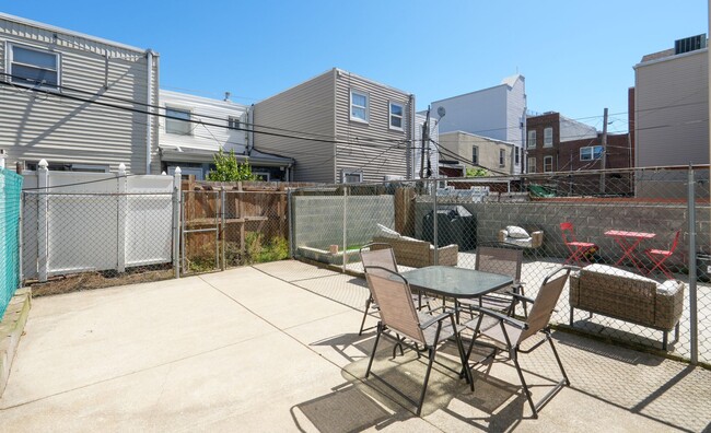 Building Photo - Charming Pennsport Rowhome with Private Backyard Oasis